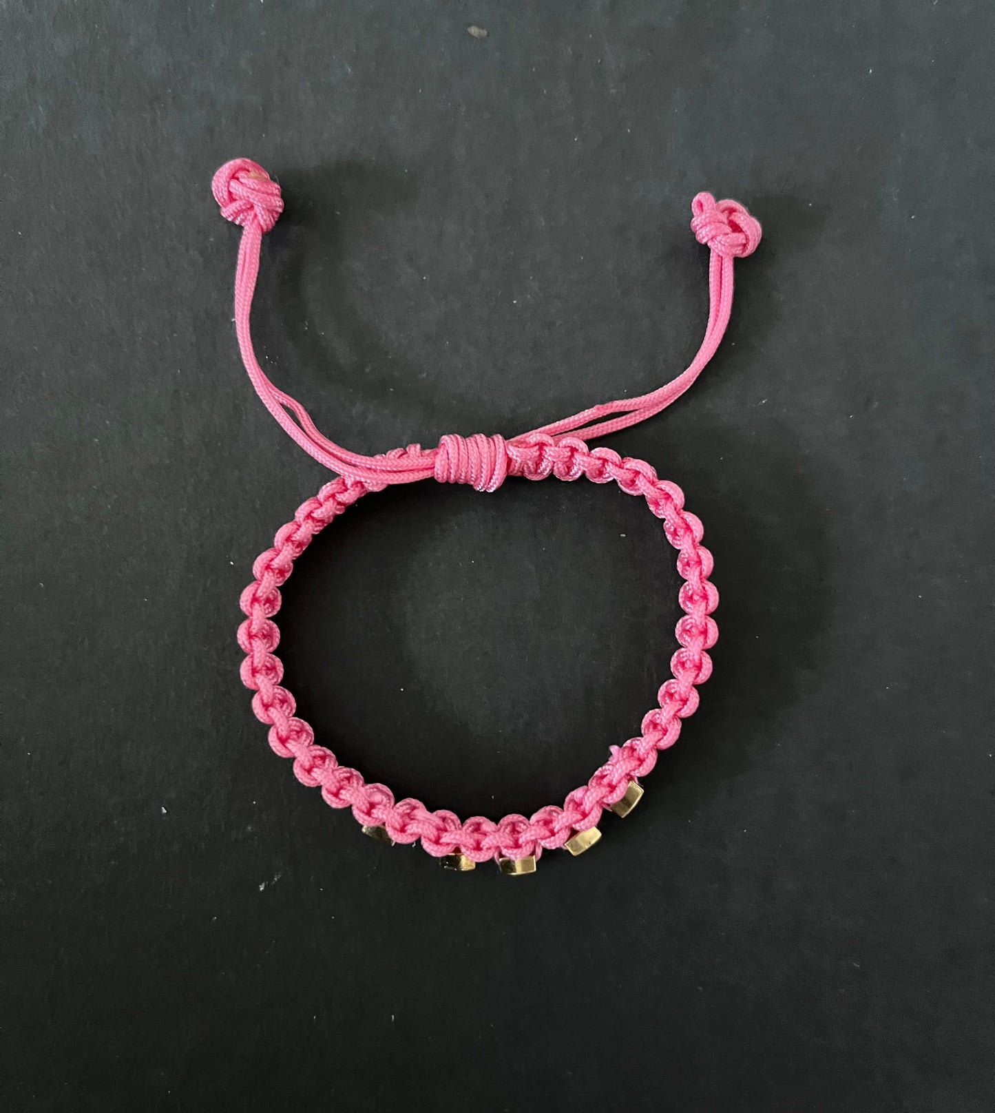 The Pink with Gold Beads Tied in Knots Bracelet